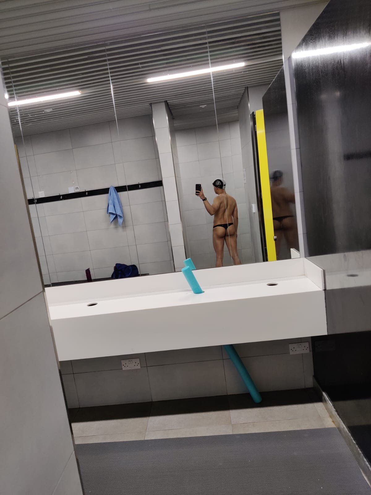 thong swimsuit in pool changing area